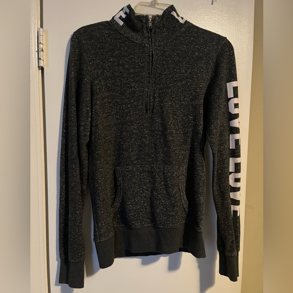 Charcoal gray pullover.
